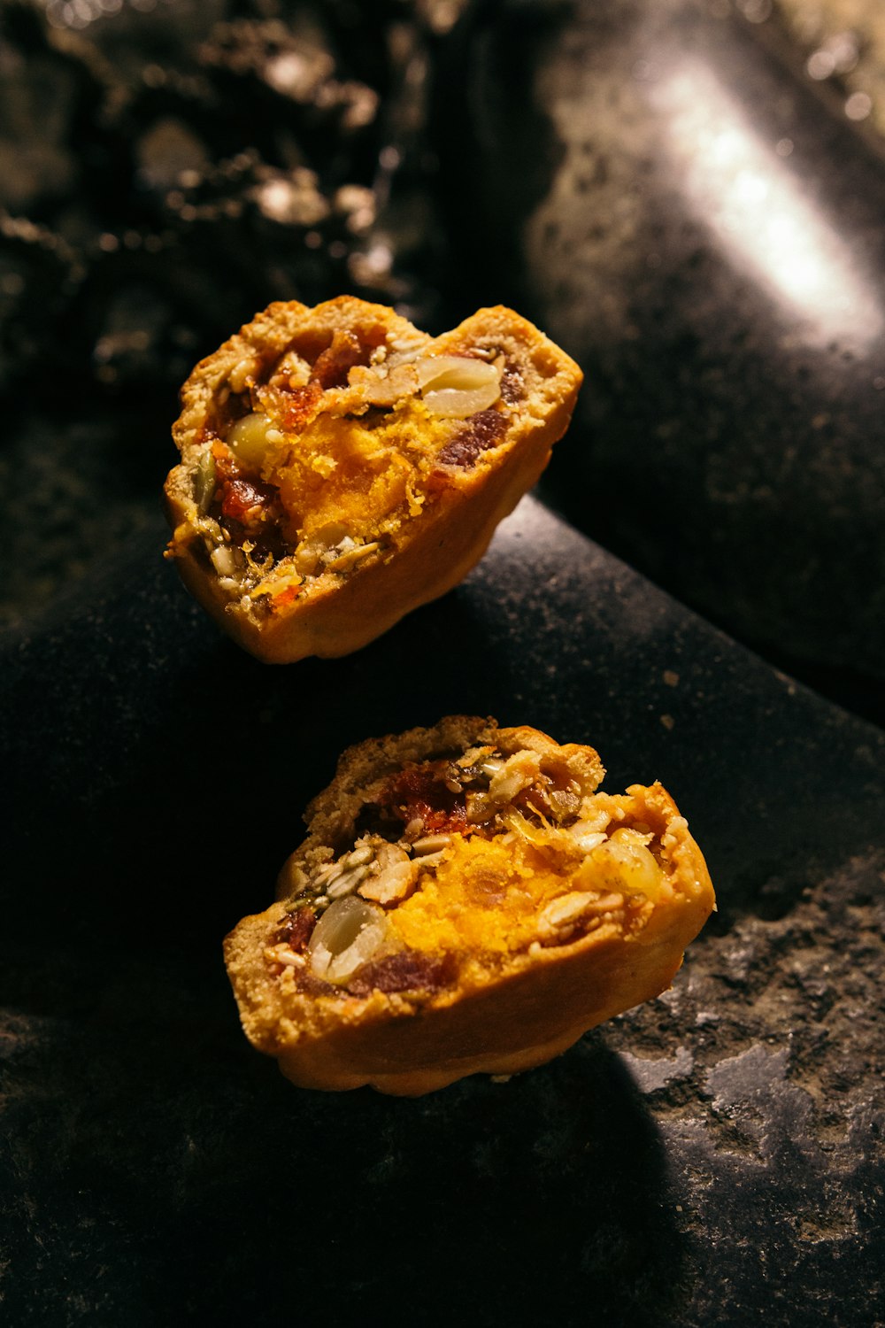 yellow and brown bread on black table