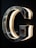 A chrome or metallic letter G is mounted on a dark background, with lighting on the inner edges creating a glowing effect. The reflective surface of the letter captures hints of the surroundings.