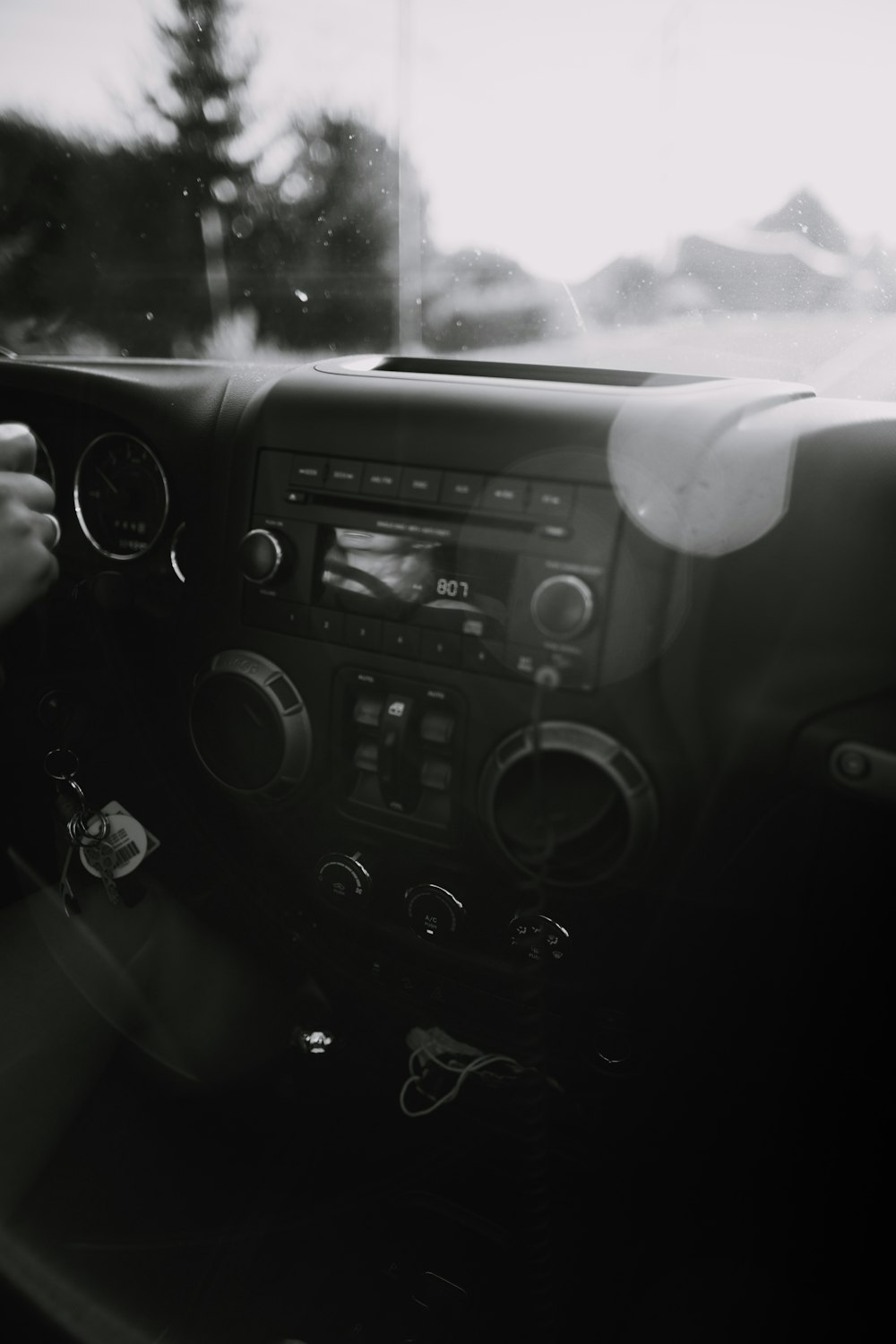 person driving car during daytime