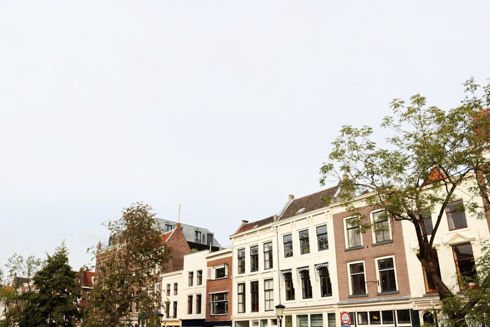 a row of buildings on a city street