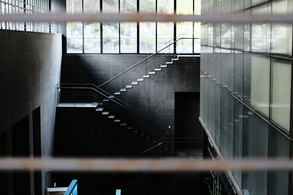 black metal fence on gray concrete stairs