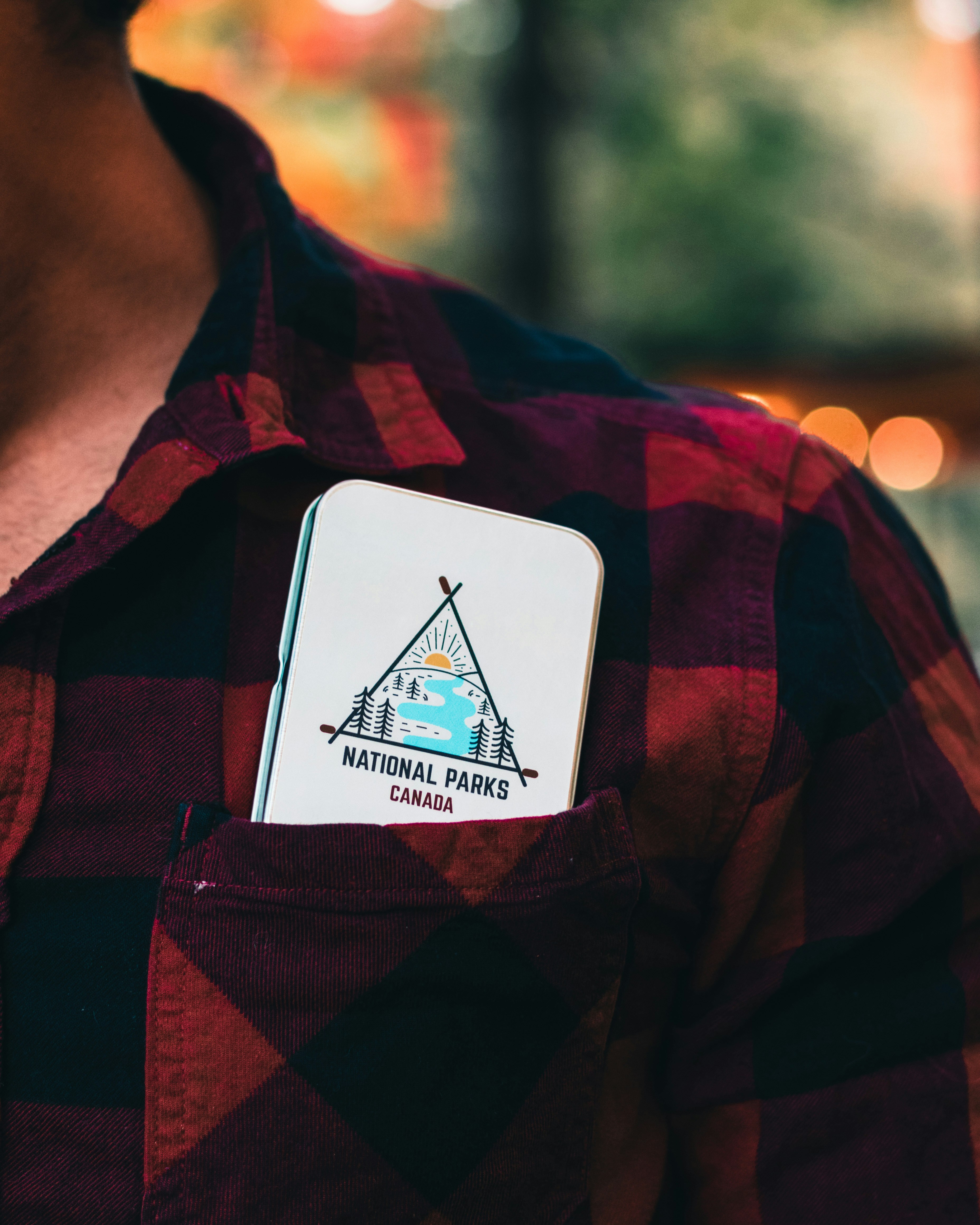 man in red and black plaid jacket