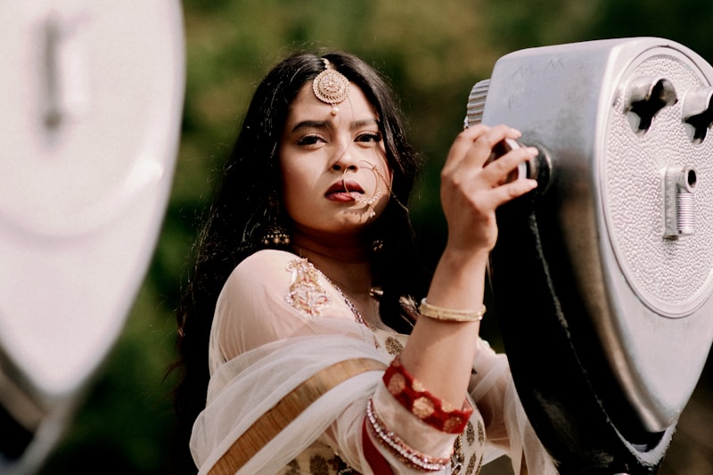 woman in white dress holding her hair