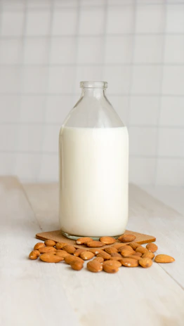 Close-up of a glass bottle filled with rich, natural coconut syrup labeled Cocoba.