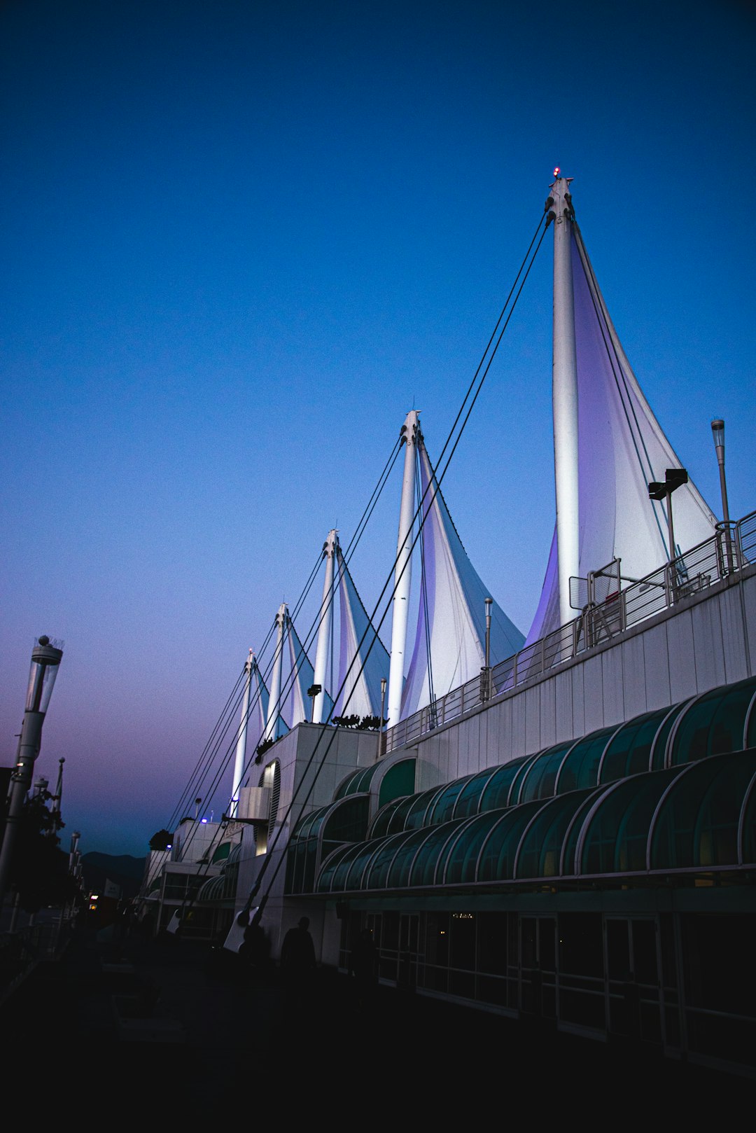 white bridge under blue sky during daytime