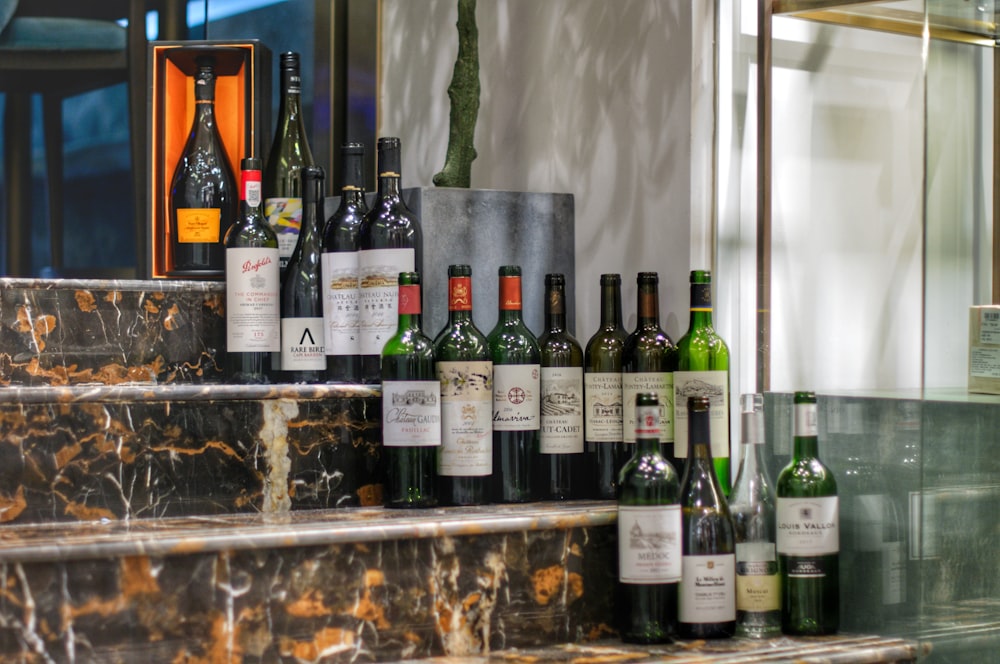 bottles on glass shelf with ice