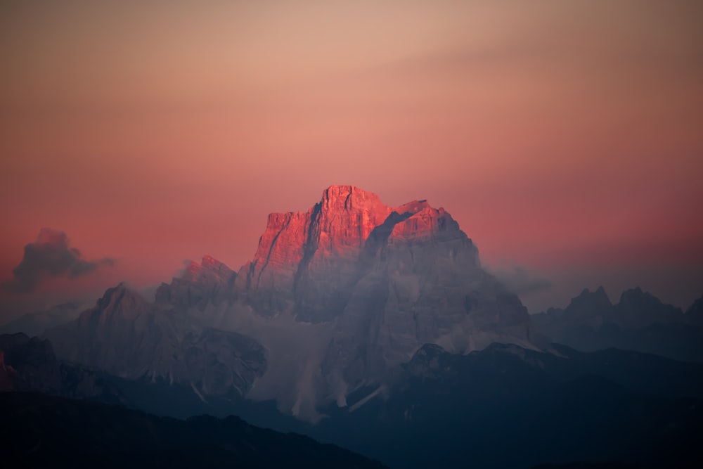 brown rocky mountain during sunset