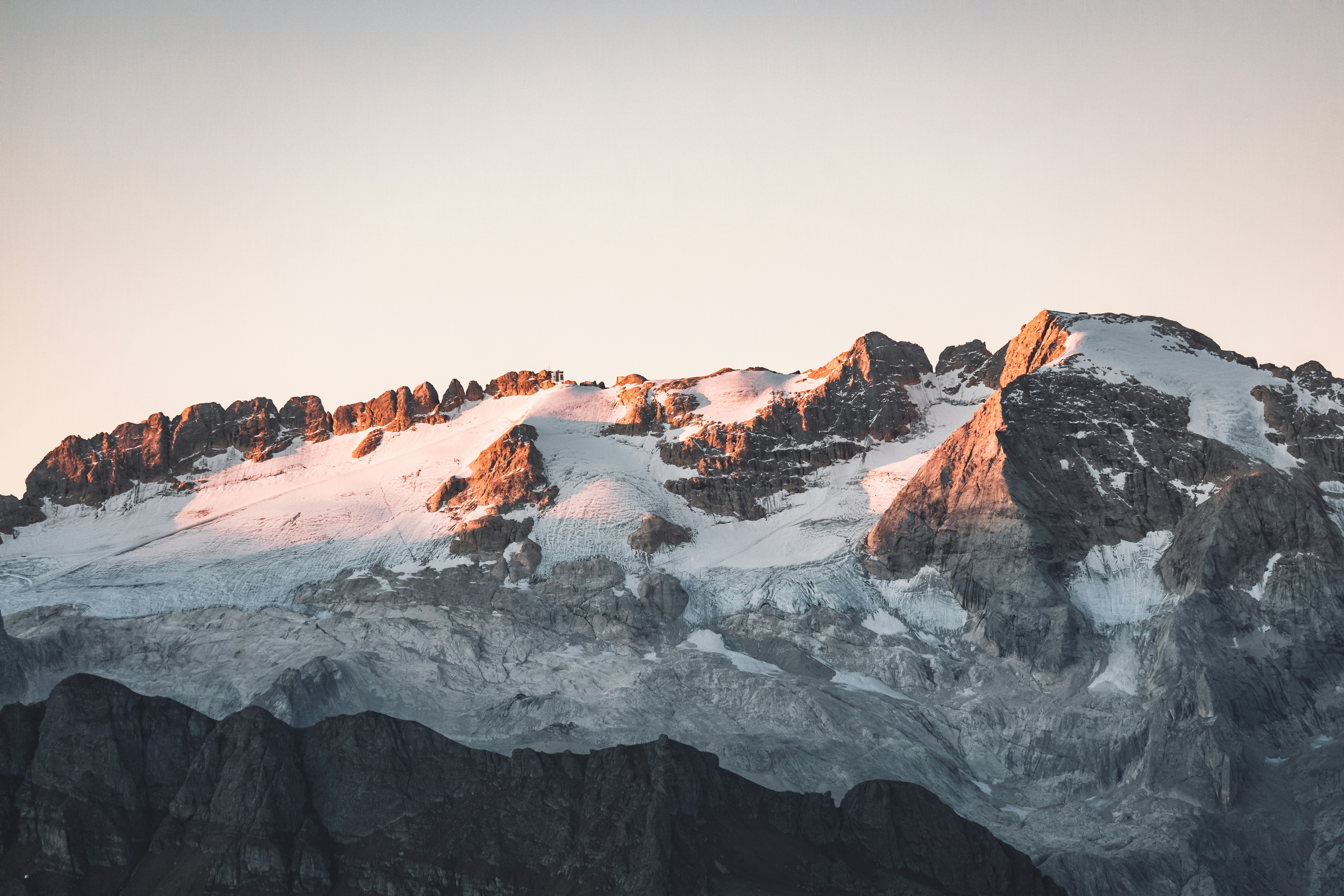 snow covered mountain during daytime