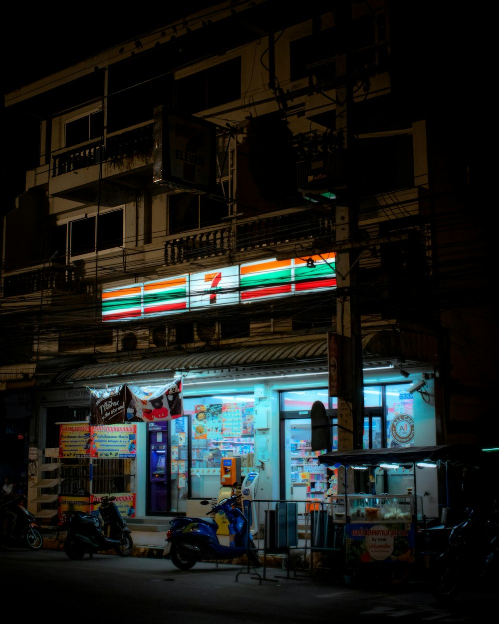 people walking on street during nighttime