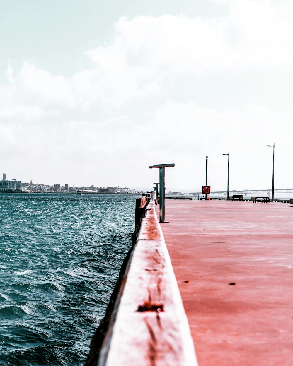 brown wooden dock on sea during daytime