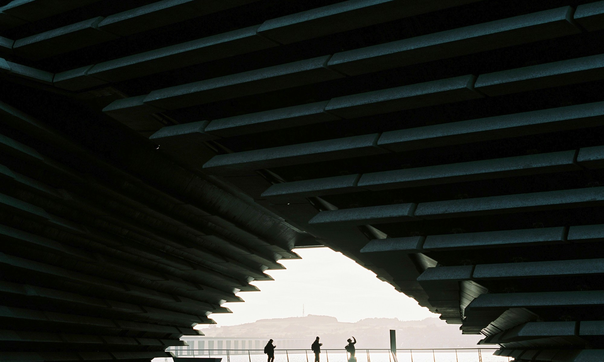 21 Places of The Future. people walking on beach during daytime