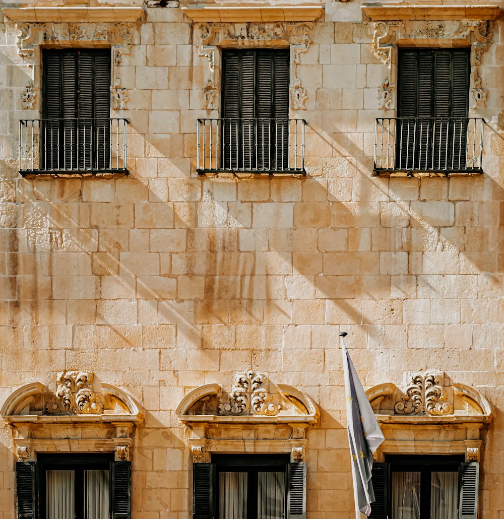 brown concrete building with window