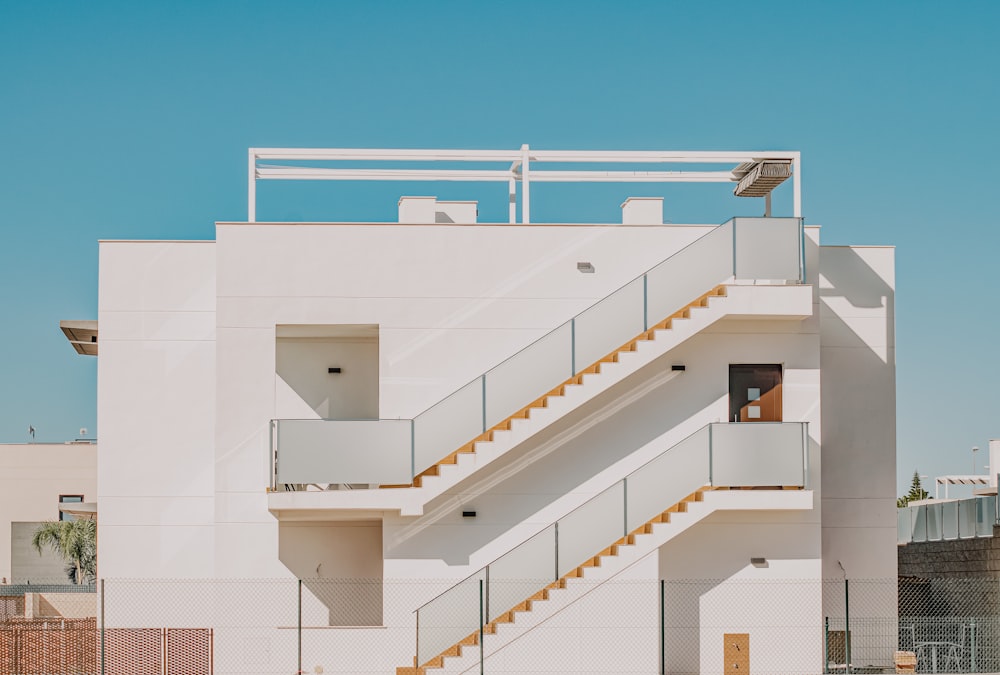 white concrete building under blue sky during daytime