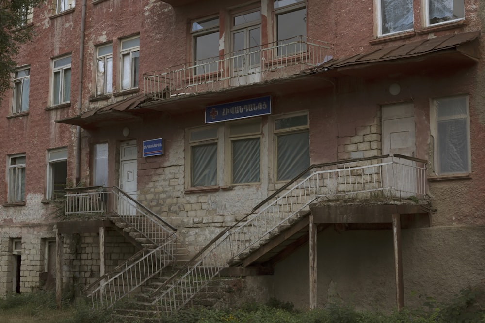 brown brick building with blue wooden door