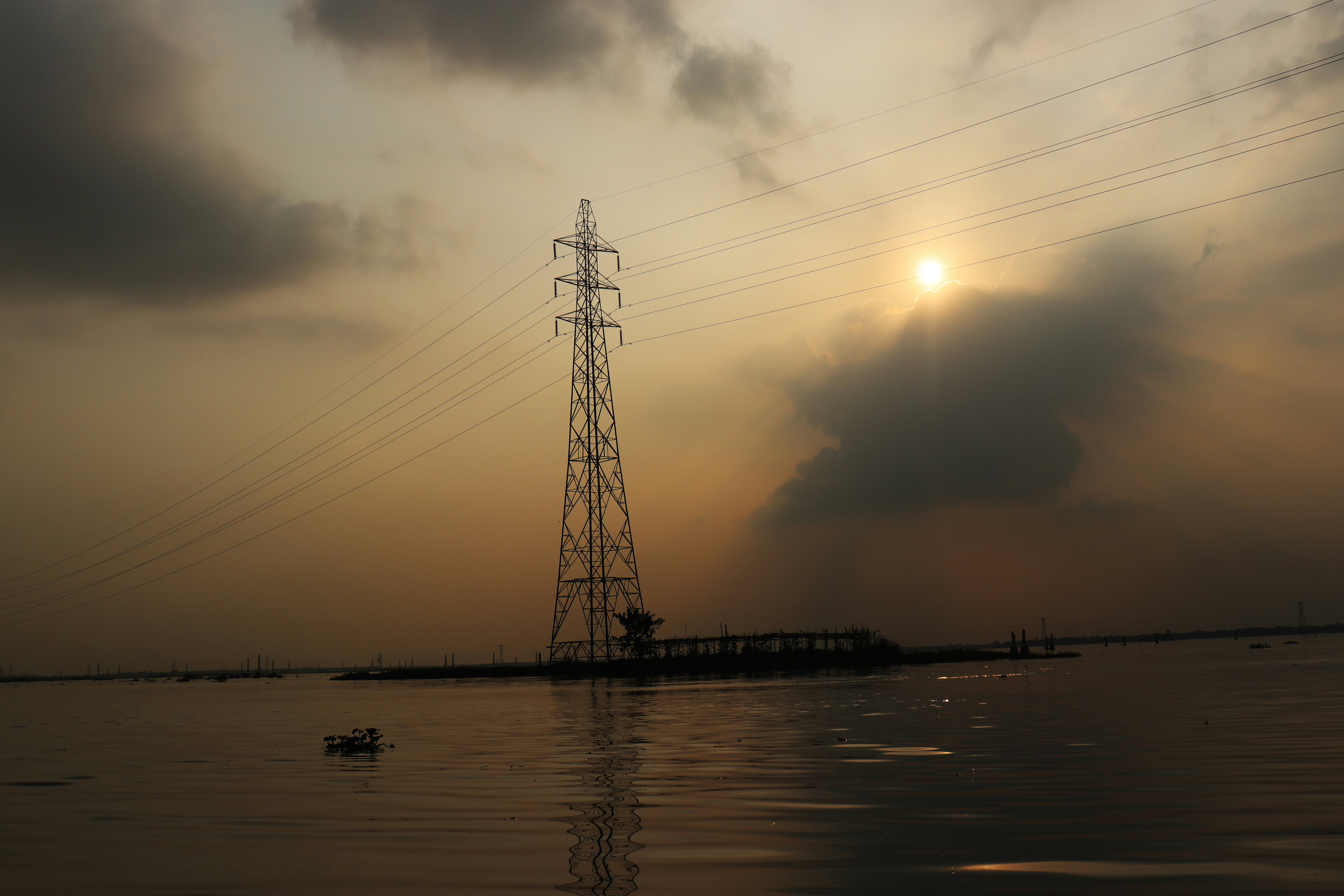 silhouette of tower during sunset