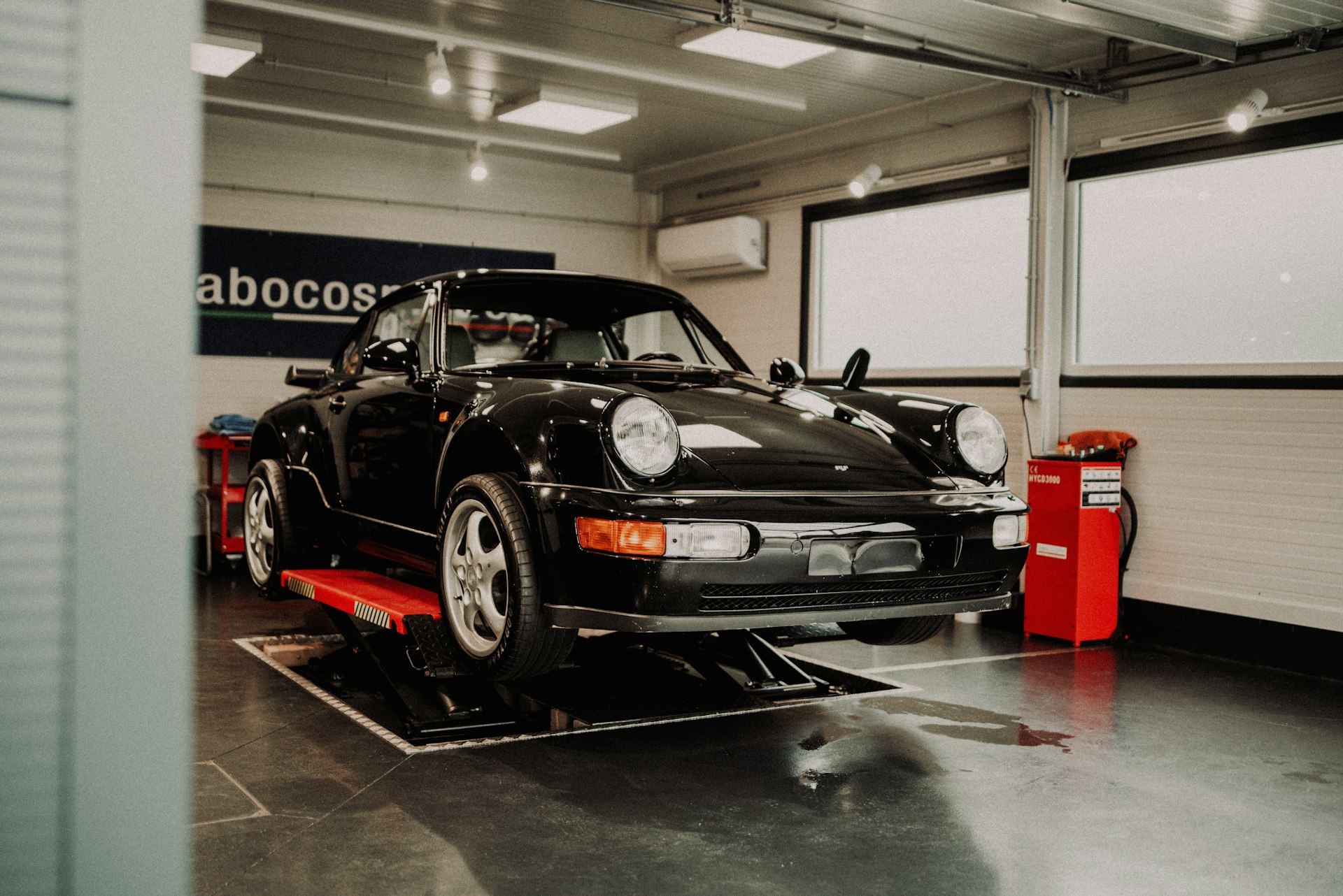 Performance car on a lift in a professional shop