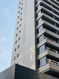 white concrete building under blue sky during daytime