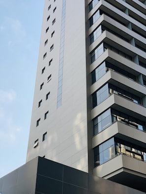 white concrete building under blue sky during daytime