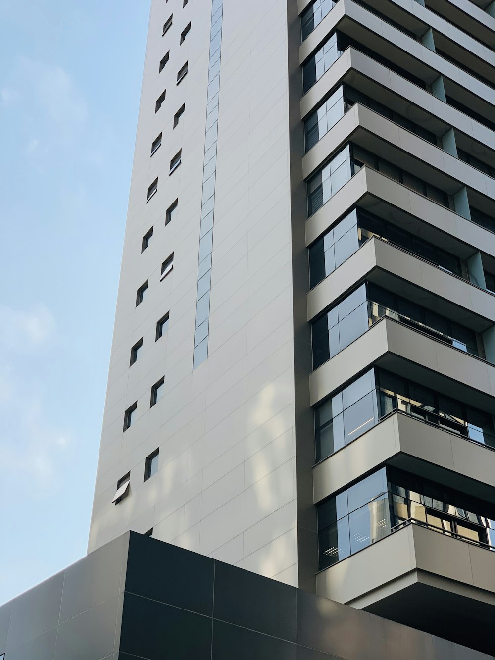 white concrete building under blue sky during daytime