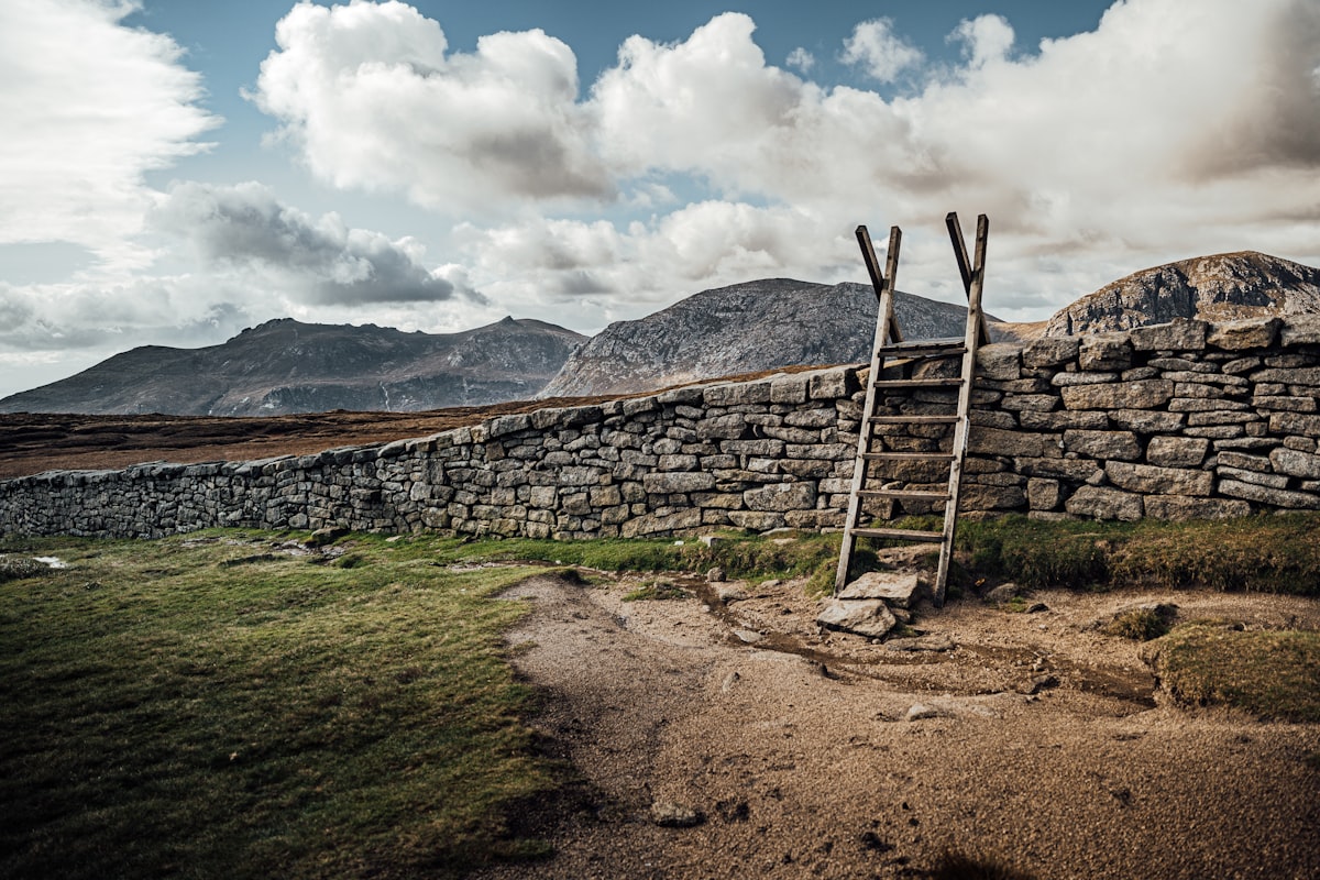 The Mourne Mountains rising above the countryside in Newry, Mourne and Down, County Down, Northern Ireland