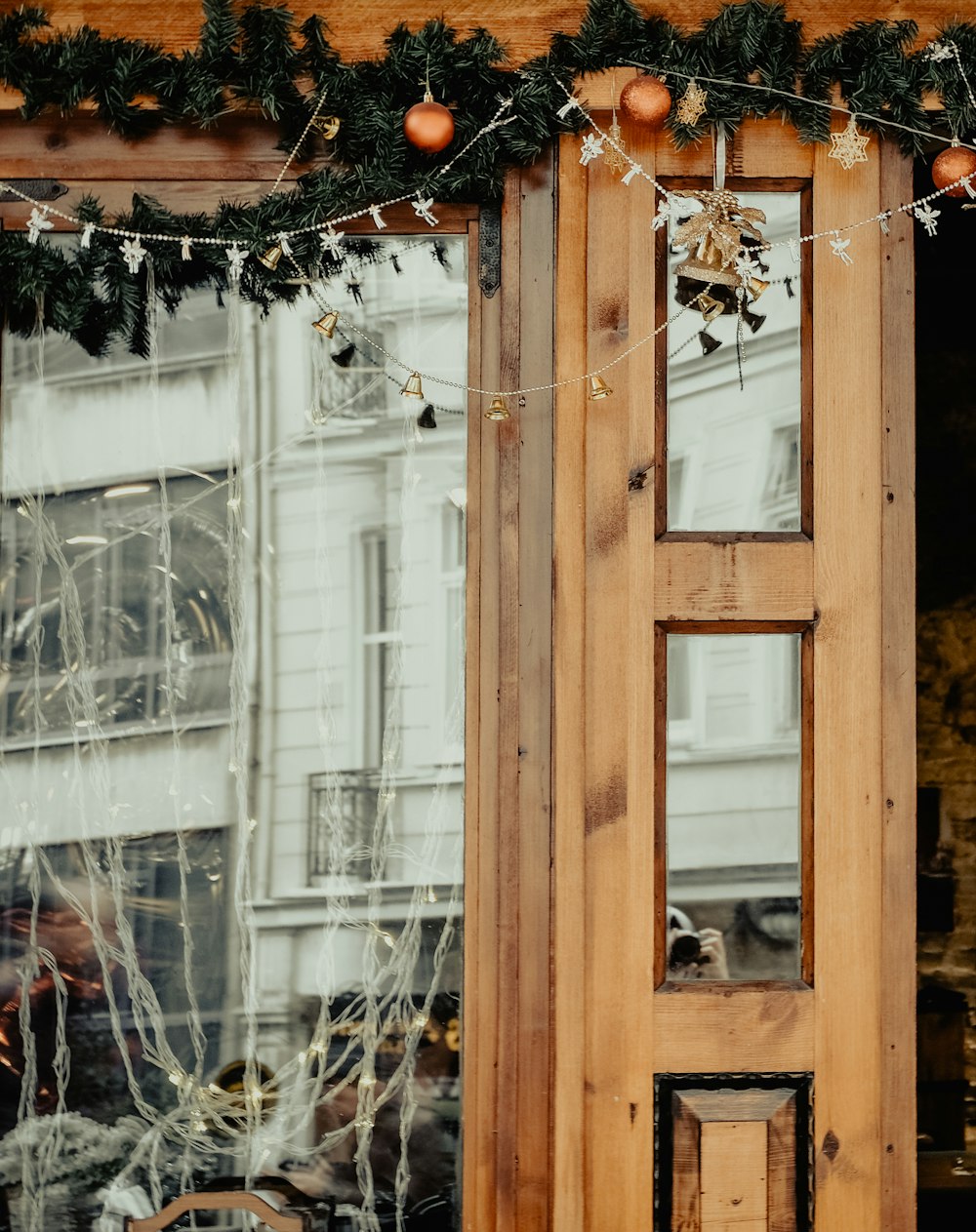 brown wooden framed glass window