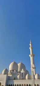 The grand mosque of Porto-Novo standing majestically under a clear blue sky.