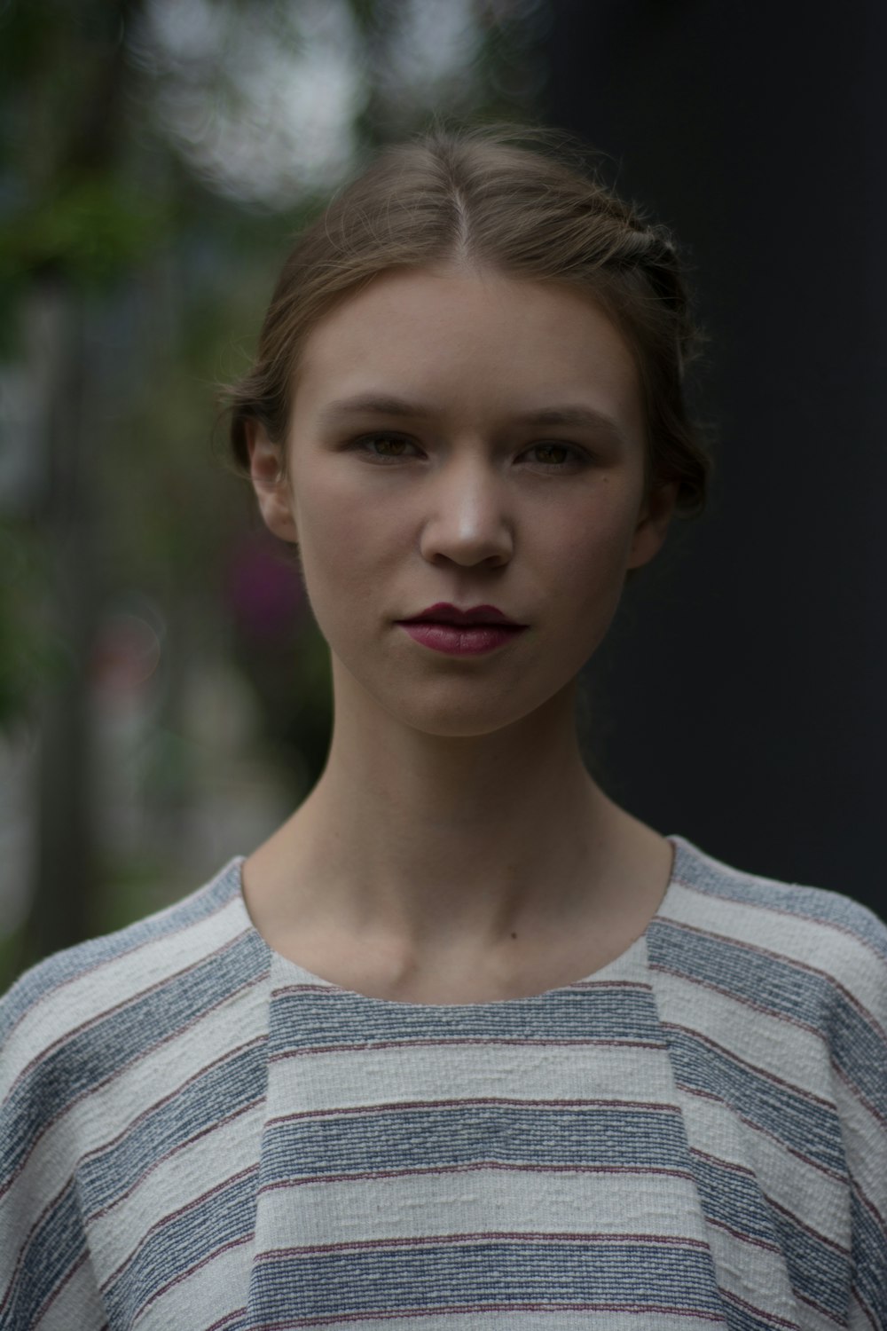 girl in white and gray striped crew neck shirt