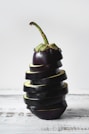 green bell pepper on black and white stripe textile