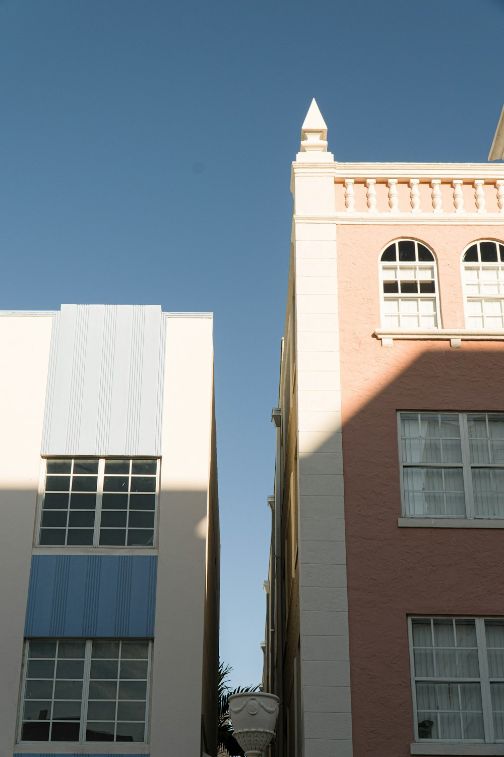 brown and white concrete building under blue sky during daytime