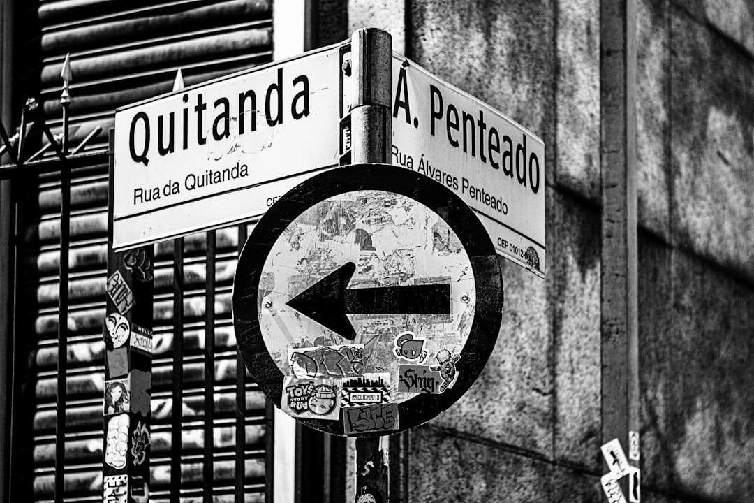 grayscale photo of no smoking sign,