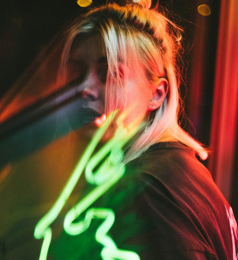 woman in black shirt with light streaks