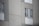 A satisfied customer giving a thumbs up in front of a new building.