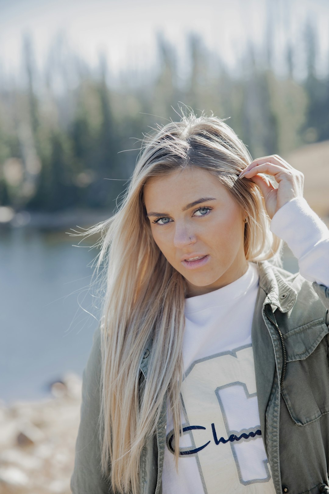 woman in white zip up jacket