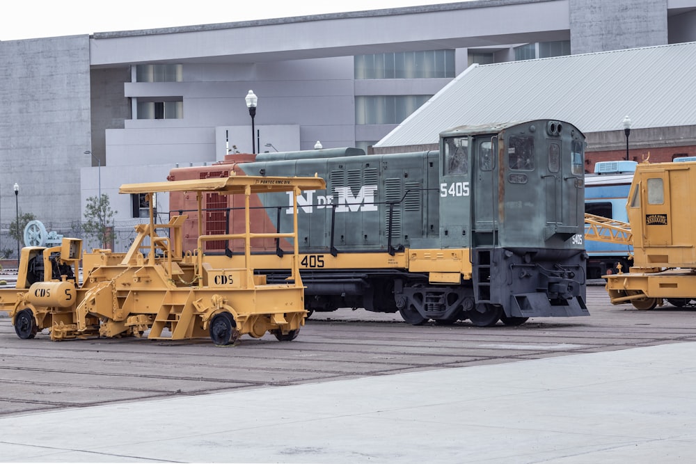 yellow and black train in a train station