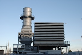 gray steel building under blue sky during daytime
