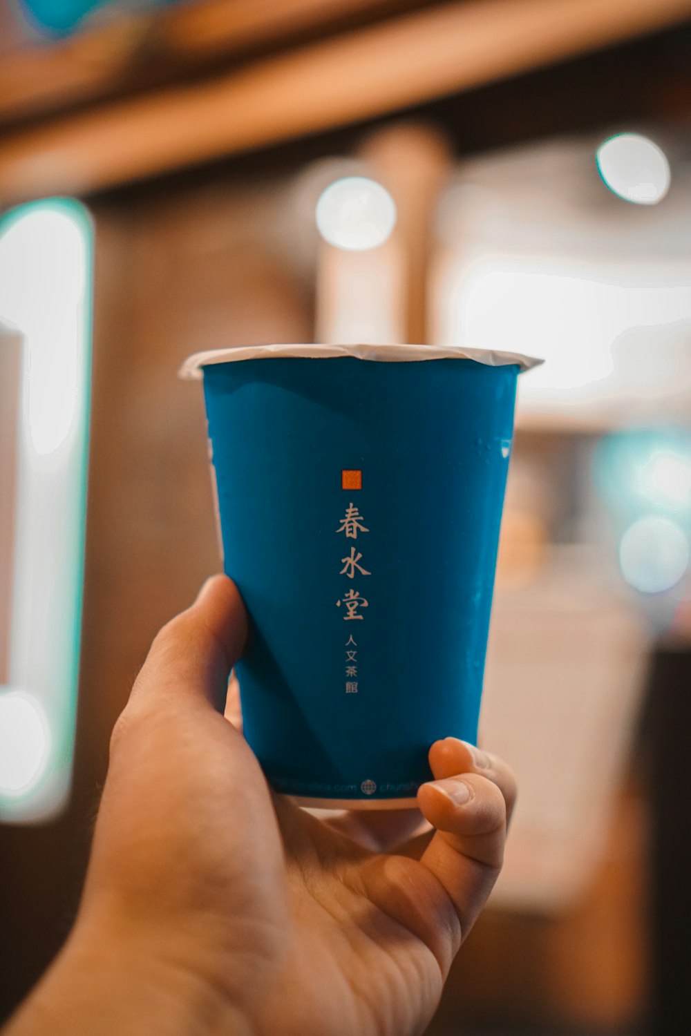 blue and white ceramic cup