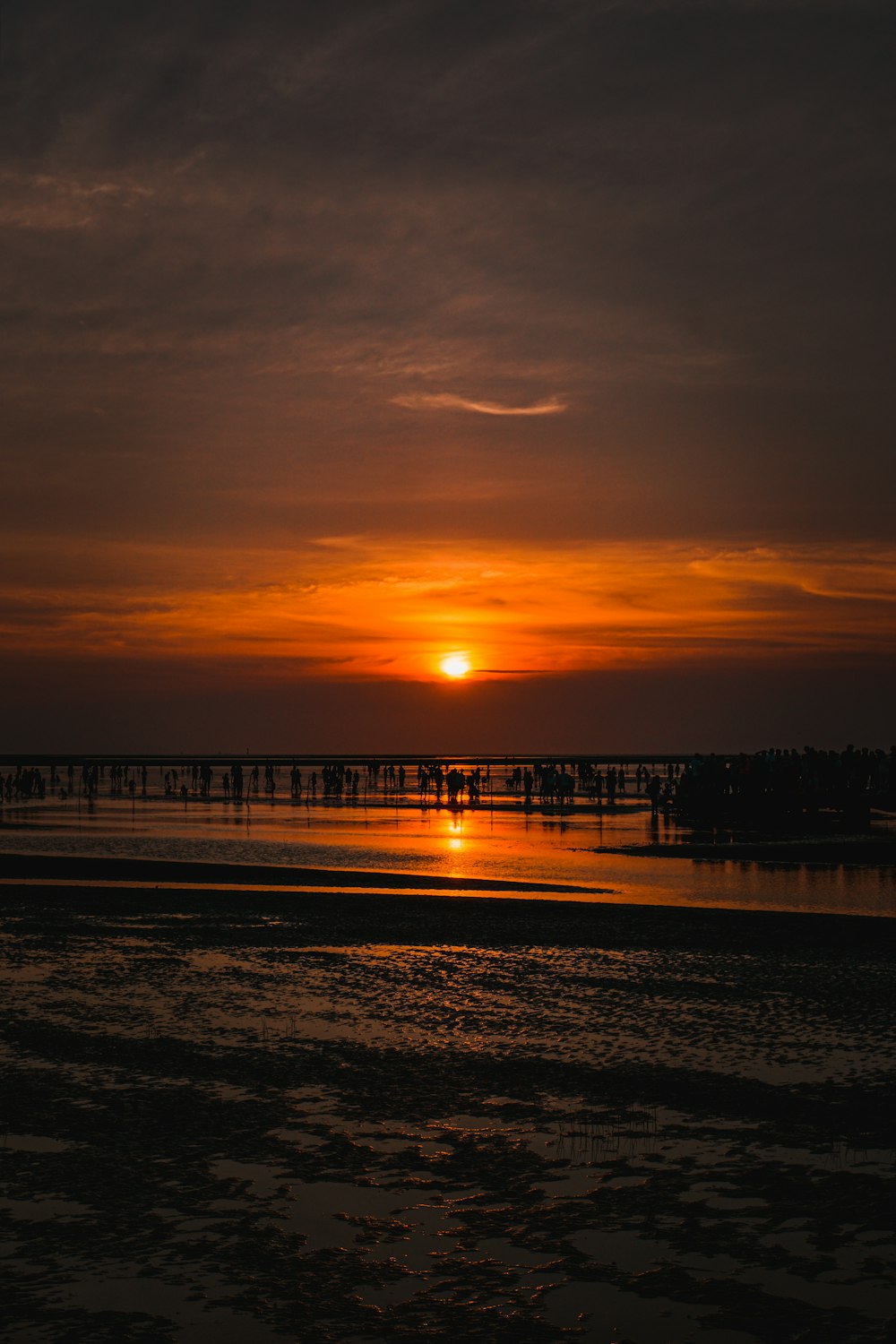 silhouette of dock during sunset