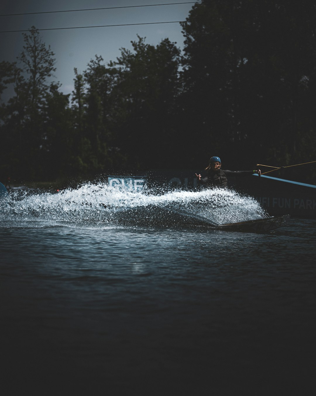 man surfing on sea waves during daytime