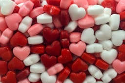 white and red heart candies