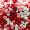 white and red heart candies