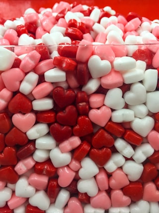 white and red heart candies