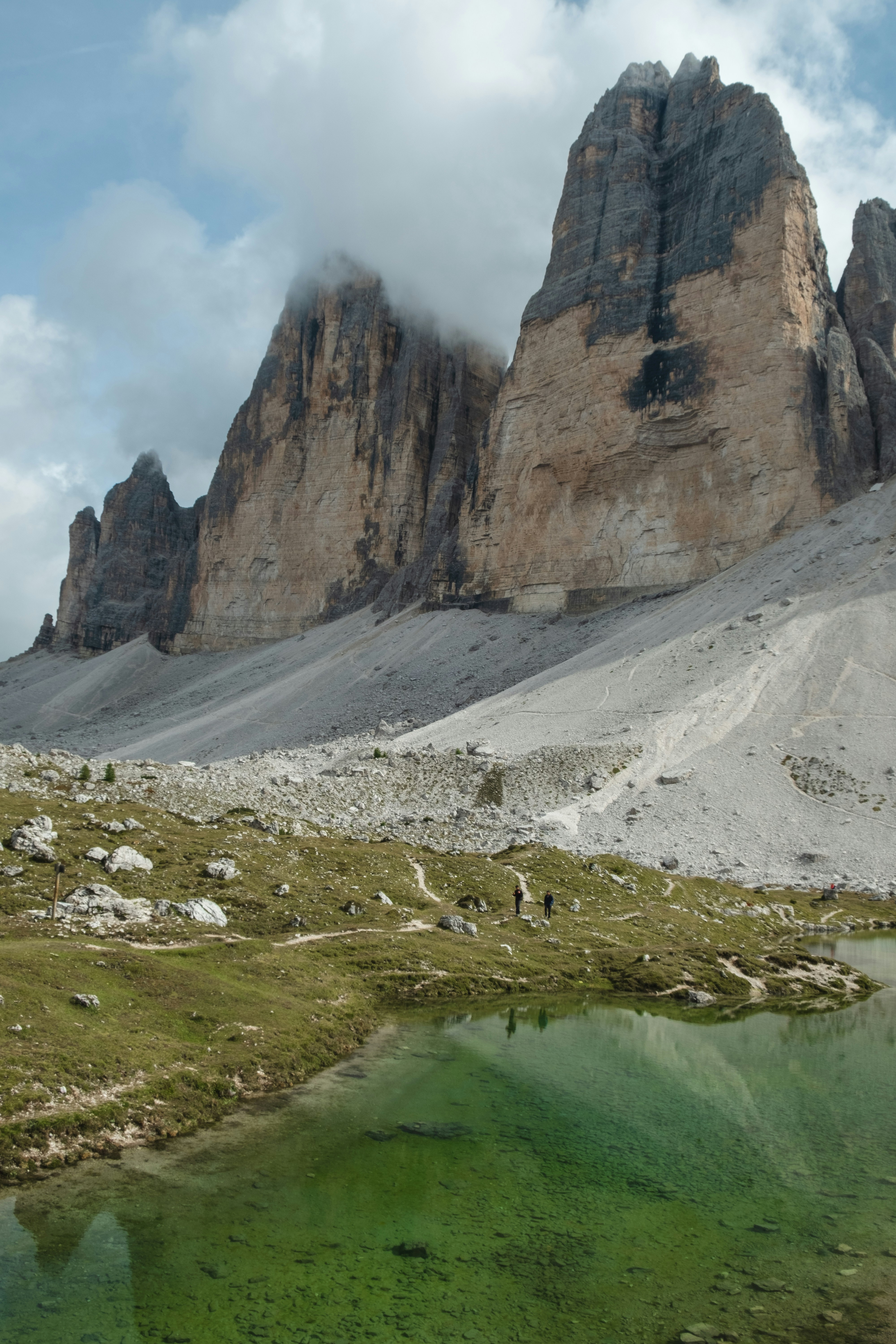 brown rocky mountain under white cloudy sky during daytime