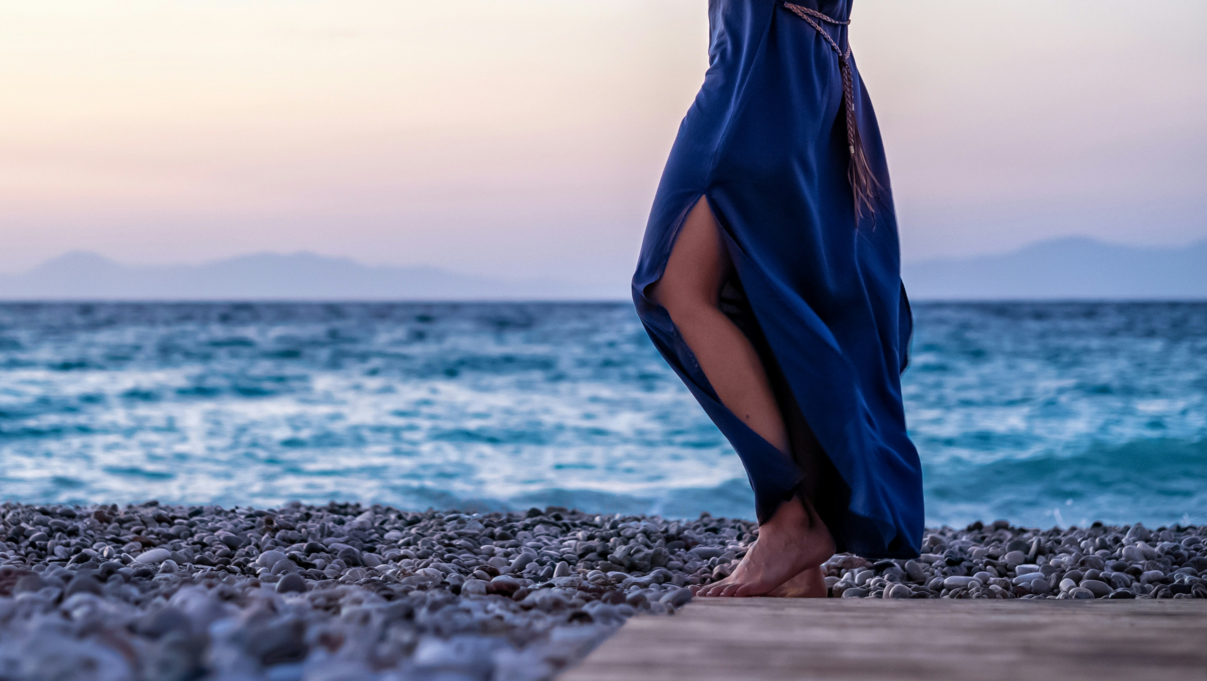 Woman in blue dress standing on beach during daytime photo – Free Sea ...