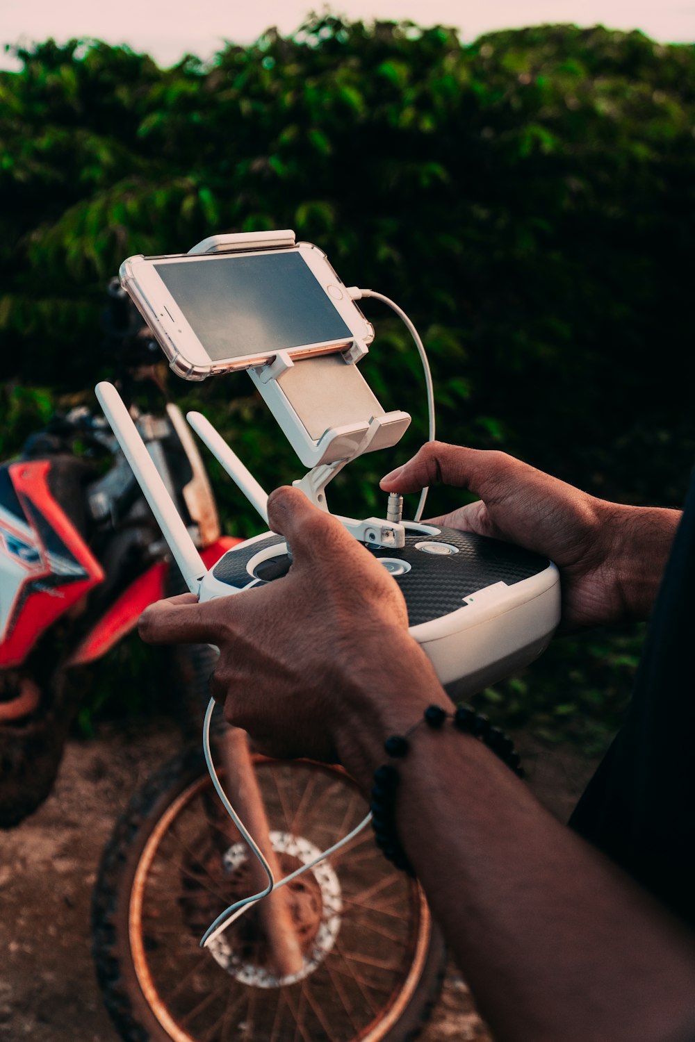 person holding white tablet computer