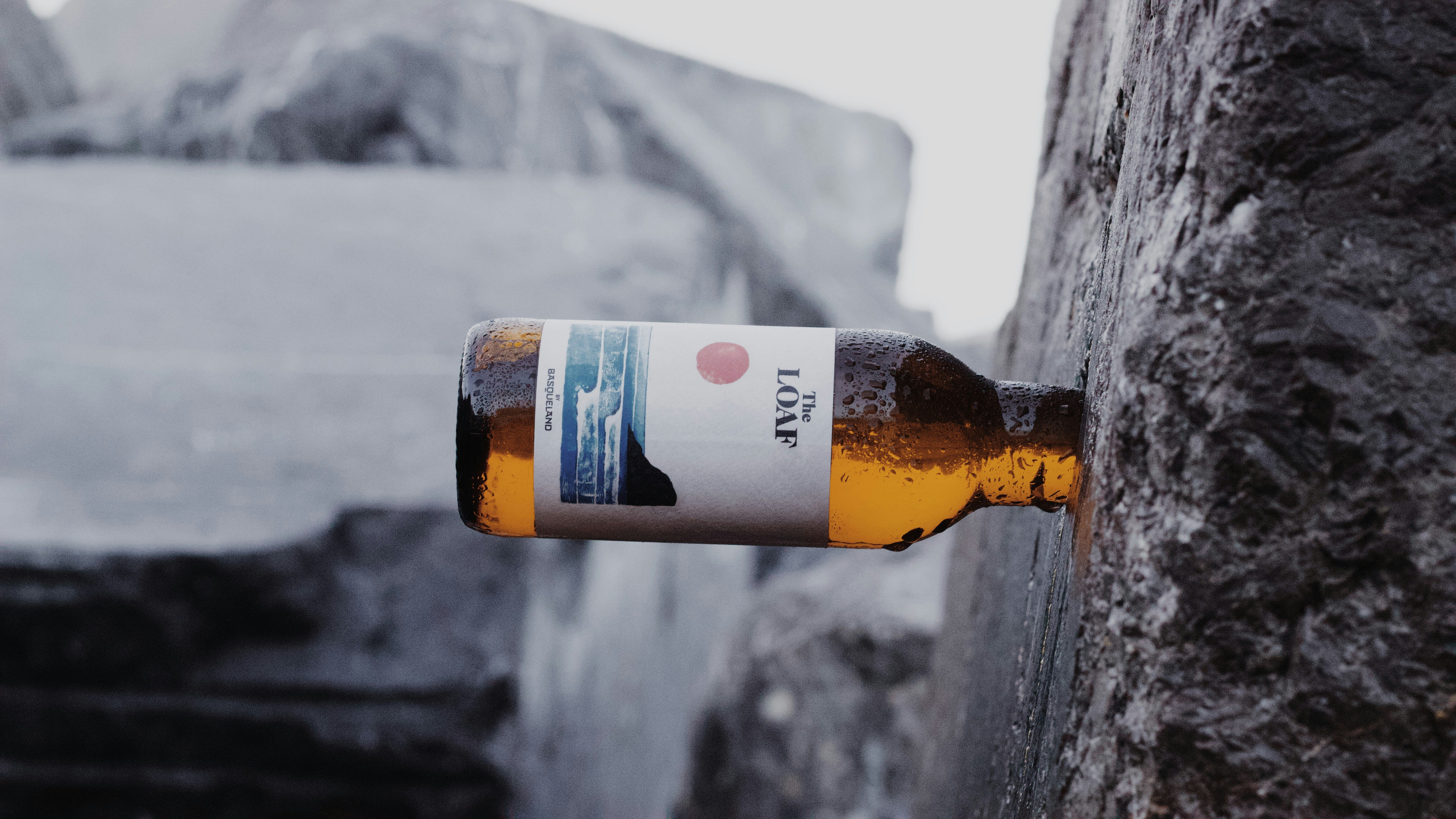 white and orange labeled bottle, Beer