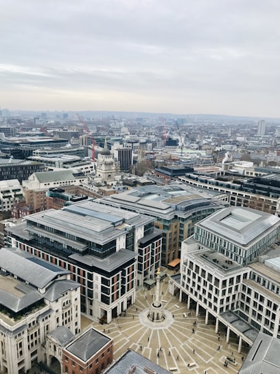 A vibrant aerial view of Vibo Place showcasing Axis Mall, Cebu Grand Hotel, and office buildings bustling with activity.