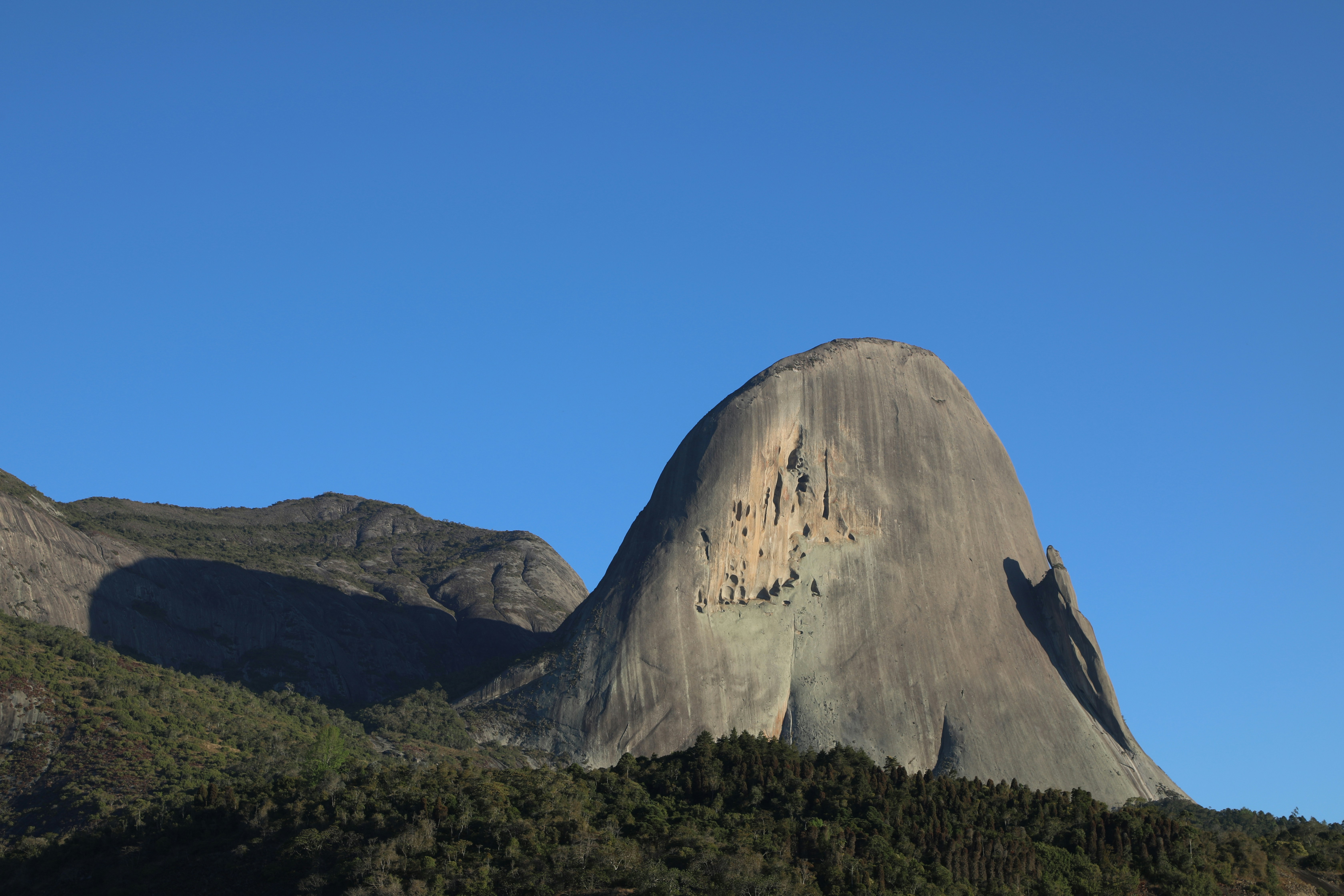 brown rock formation under blue sky during daytime