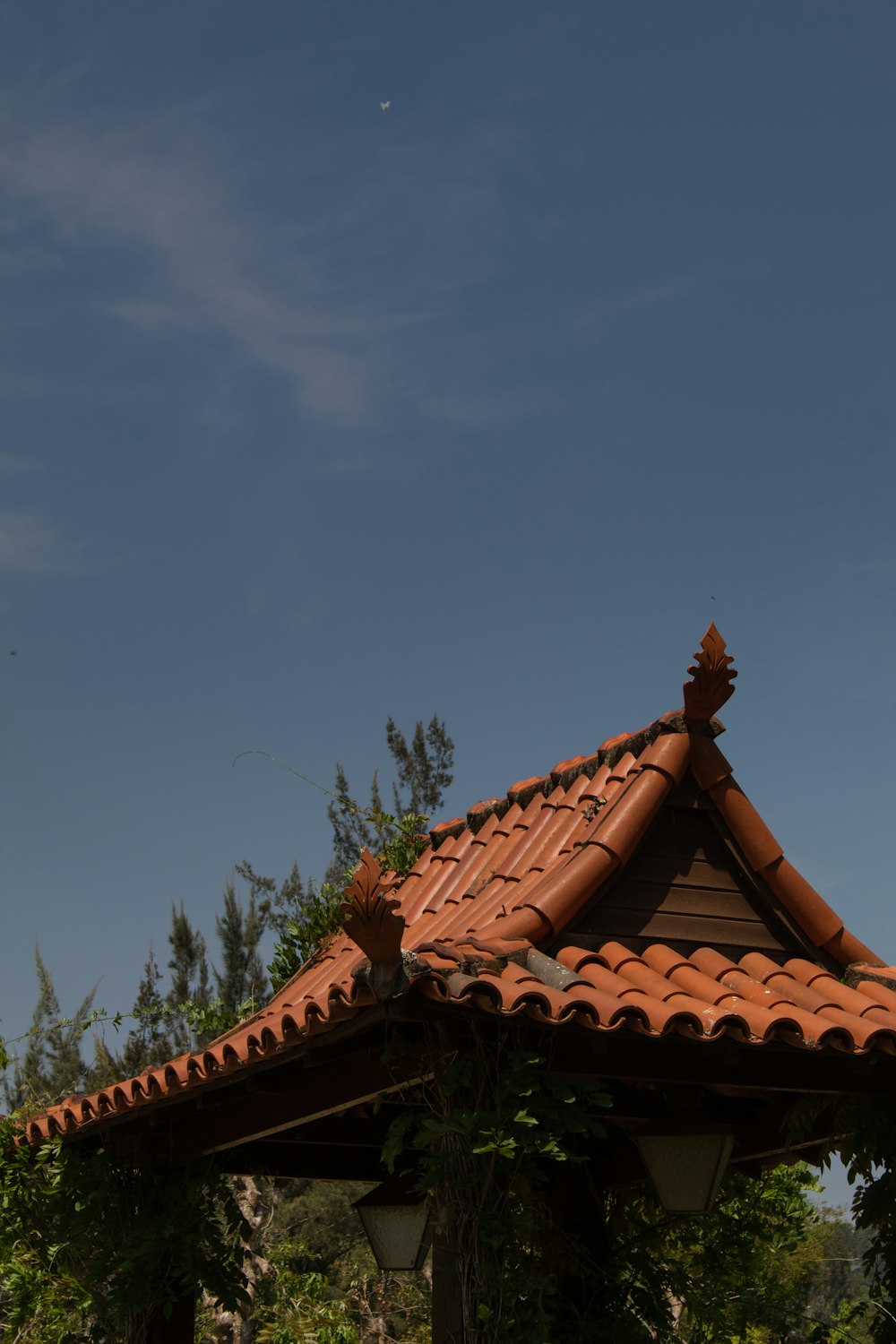 brown roof under blue sky during daytime