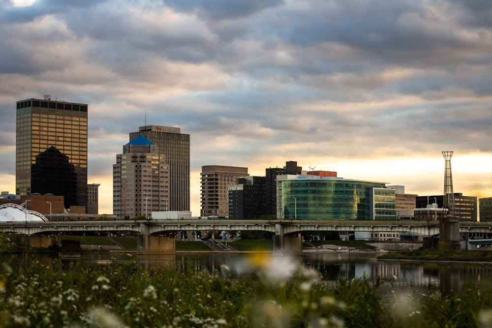 city skyline under gray cloudy sky during daytime