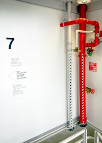 red and white metal pipe